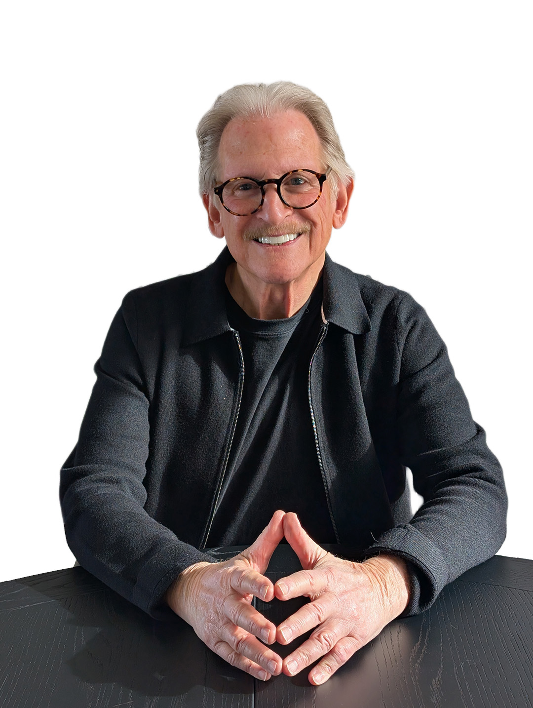 Harvey Smith seated hands showing